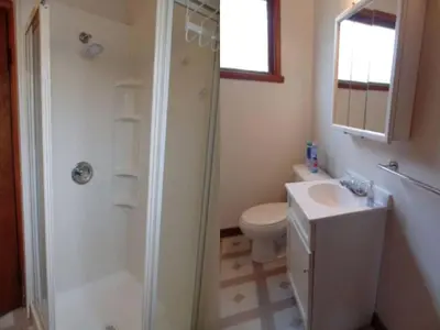 a bathroom with a shower and a toilet and a sink at Secluded Cottage Rental in the Trees by Lake Erie, Ohio in Marblehead
