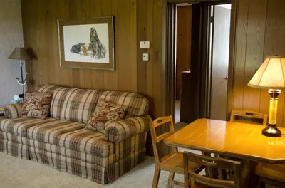 a living room with a couch and a table at Tranquil Weekend Getaway for a Large Group near the Cuyahoga Valley National Park, Ohio in Sandusky