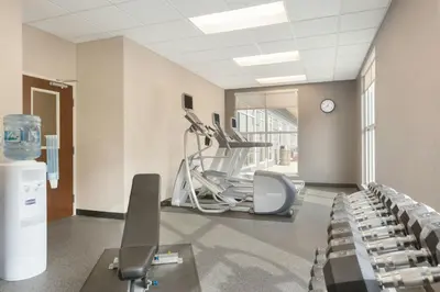 a dental room with chairs and a machine in a building at Fairfield Inn & Suites by Marriott Pittsburgh Airport/Robinson Township in Robinson Township