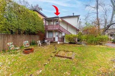 a house with a red arrow pointing into a yard at OSU - Heart of Short North -STEPS from High ST-OSU in Columbus