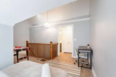 a room with a bed and a desk at Luxury Chefs Kitchen - OSU/Short North - Sleeps 10 in Columbus