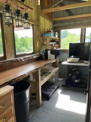 a room with a wooden desk in a cabin at RV Camper in New Lexington