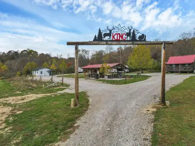 a sign that says kings lane on a dirt road at RV Camper in New Lexington
