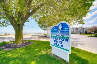 a sign for the entrance to a childrens reef club at 1 Mi to Ferry Port Clinton Condo with Beach View! in Port Clinton
