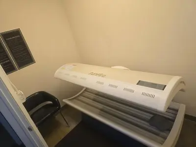 a hospital room with a white machine on a shelf at Delightful Downtown Free parking in Cleveland