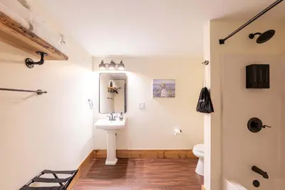 a bathroom with a sink and a toilet at Cozy Corner - Room 5 in Versailles
