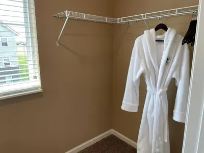 a bathroom with white towels hanging on a rack at Retreat At The Charles Fast WiFi WasherDryer in Dublin