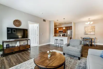 a living room with a couch and a table at Paws Of Polaris 2BR 1st Floor Walk-In Shower in Westerville