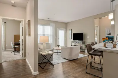a living room with a kitchen and a living room at Cozy Dublin 2BR 1st Floor Easy Free Parking! in Dublin