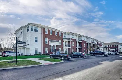 a street with cars parked in front of buildings at Cozy Dublin 2BR 1st Floor Easy Free Parking! in Dublin