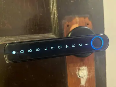 a close up of a door handle on a microwave at Cozy room in 2nd floor - near Airport & Lakewood in Cleveland