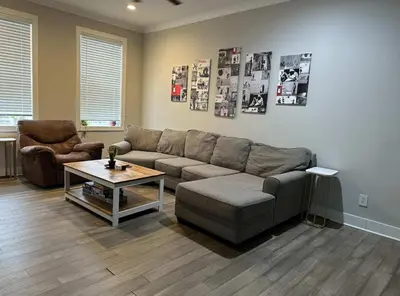 a living room with a couch and a coffee table at Cincy Comfort Retreat in Cincinnati