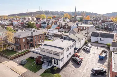 an aerial view of a city with a building at The Grand Elm Suite 1 - Sleeps 4 in Ludlow