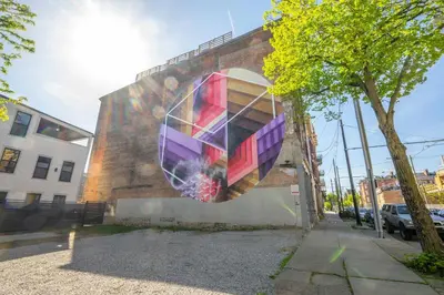 a mural on the side of a building at Findlay Market - Suite 5 for 2 in Cincinnati