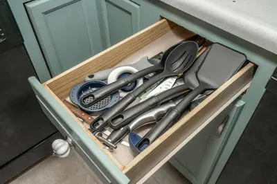 a drawer filled with cooking utensils in a cabinet at Arkstone Retreat 2 - Chic 2 Bedroom in Williamstown