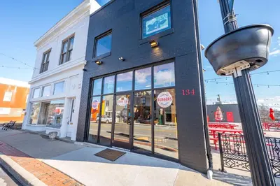 a building on the corner of a city street at Arkstone Retreat 2 - Chic 2 Bedroom in Williamstown