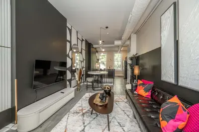 a living room with a couch and a table at Queen City Views 2 Sleeps 2 in Cincinnati