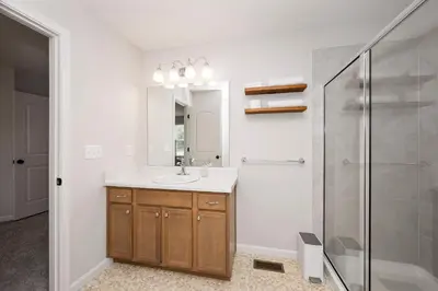 a bathroom with a sink and a shower at Lunar Haven - Gorgeous 5 BDR in Walton