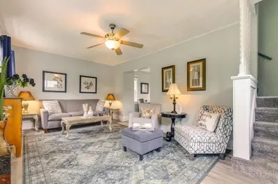 a living room with furniture and a ceiling fan at 3 Mi to Dtwn Dog-Friendly Retreat in Dayton in Dayton