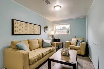 a living room with a couch and two chairs at 10 Mi to Dtwn Cincinnati Home with Patio and Yard! in Cincinnati