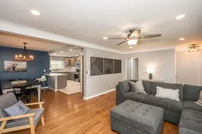 a living room with a couch and a table at Love 'n Life Haven in Cincinnati