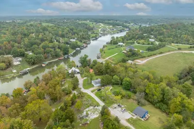 an aerial view of a river with a house at The Ark Encounter Getaway in Williamstown