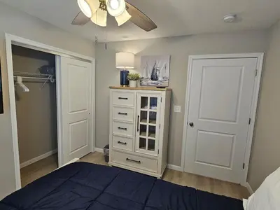 a bedroom with a bed and a ceiling fan at New Construction 4 Bedroom Ranch in Trenton in Trenton