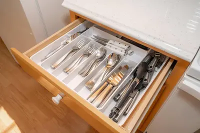 a drawer with silver utensils in a kitchen at Horse Haven - 4 BDR Charmer Close to Ark Encounter in Williamstown
