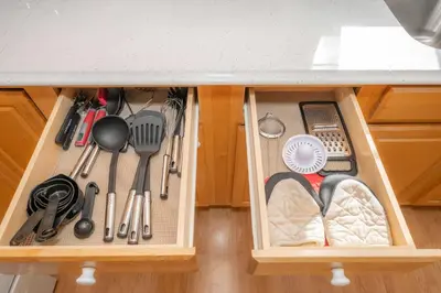 a drawer in a kitchen with utensils at Horse Haven - 4 BDR Charmer Close to Ark Encounter in Williamstown