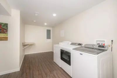 a white kitchen with a stove and a dishwasher at Horse Haven - 4 BDR Charmer Close to Ark Encounter in Williamstown