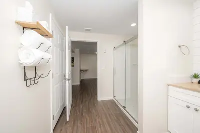 a bathroom with white cabinets and a walk in shower at Horse Haven - 4 BDR Charmer Close to Ark Encounter in Williamstown