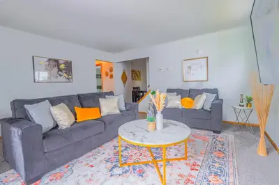 a living room with two couches and a coffee table at 3 bedrooms at Cleveland in Euclid
