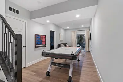 a living room with a pool table in it at Oakley Gold Std New Construc 4king bed 4ens bthrm in Cincinnati