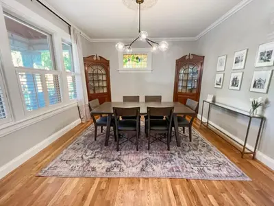 a dining room with a table and chairs at Cute & Cozy 2 bed 1 and a half bath Oakley in Cincinnati