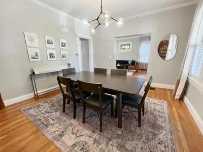 a dining room with a table and chairs at Cute & Cozy 2 bed 1 and a half bath Oakley in Cincinnati