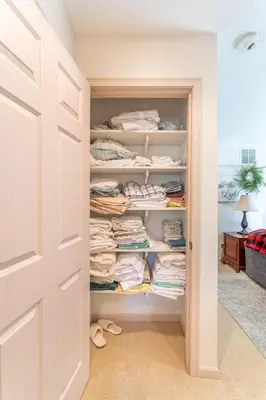 a walk in closet with a door open at Spring Mountain Cove in Warsaw