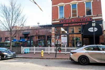 a car parked on the street in front of a store at Mt Adams Nest - Studio for 2 in Cincinnati