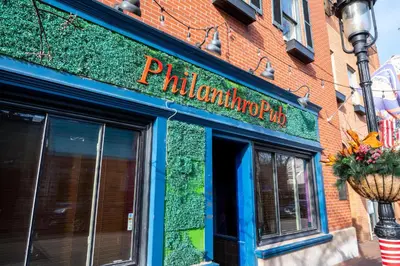 a building with a sign for a restaurant at Mt Adams Nest - Studio for 2 in Cincinnati
