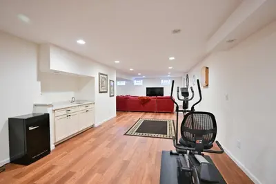 a kitchen and living room with a home gym at Luxurious Dream Home - For 10 in Loveland