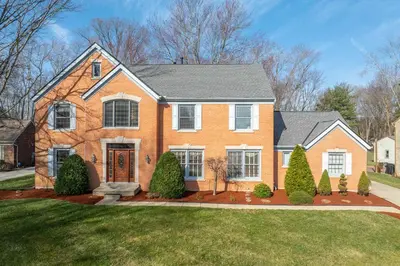 a large brick house with a yard at Luxurious Dream Home - For 10 in Loveland