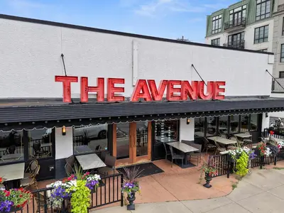 a restaurant with a sign that reads the avenue at Classic Charm on Ashland - For 8 in Columbus