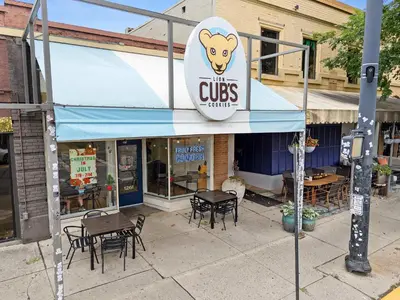 a restaurant with a cus sign on the front of it at Classic Charm on Ashland - For 8 in Columbus