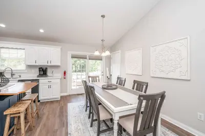a kitchen and dining room with a table and chairs at Crittenden Ark Haven in Crittenden