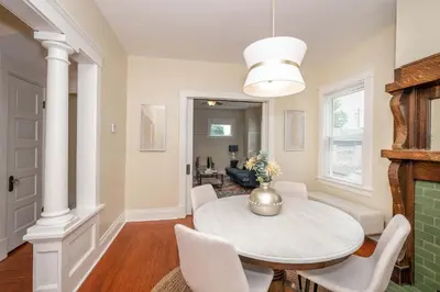 a dining room with a table and chairs at The Cincinnati Cottage in Cincinnati