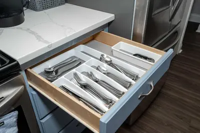 a drawer in a kitchen with utensils in it at Heart of Mainstrasse 3 in Covington