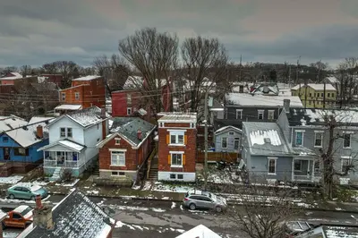 a group of houses in a snow covered neighborhood at The LUXE Spot 1 in Covington