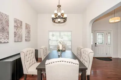 a dining room with a table and chairs at Urban Escape in Cincinnati