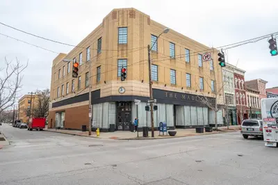 a building on the corner of a street at The Heart of Madison 3 in Covington
