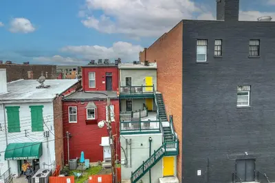 a group of buildings next to each other at The Heart of Madison 3 in Covington