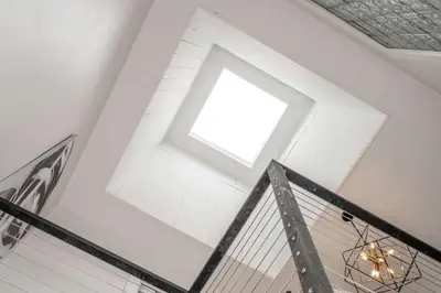 a skylight in the ceiling of a building at The Heart of Madison Suites in Covington